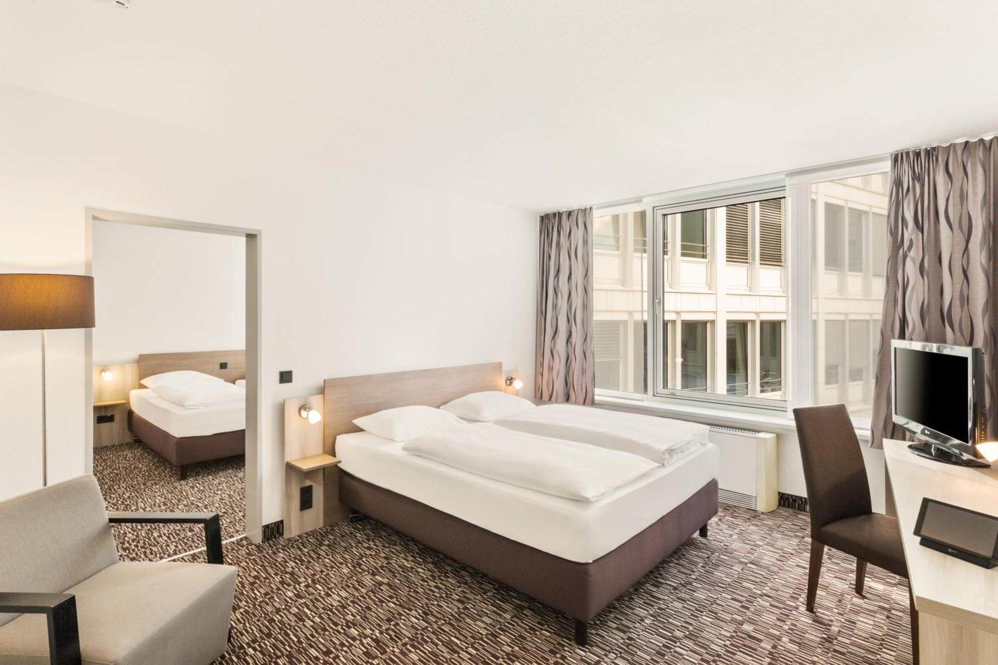 Two-Room Family Room with One Double and Two Single Beds
